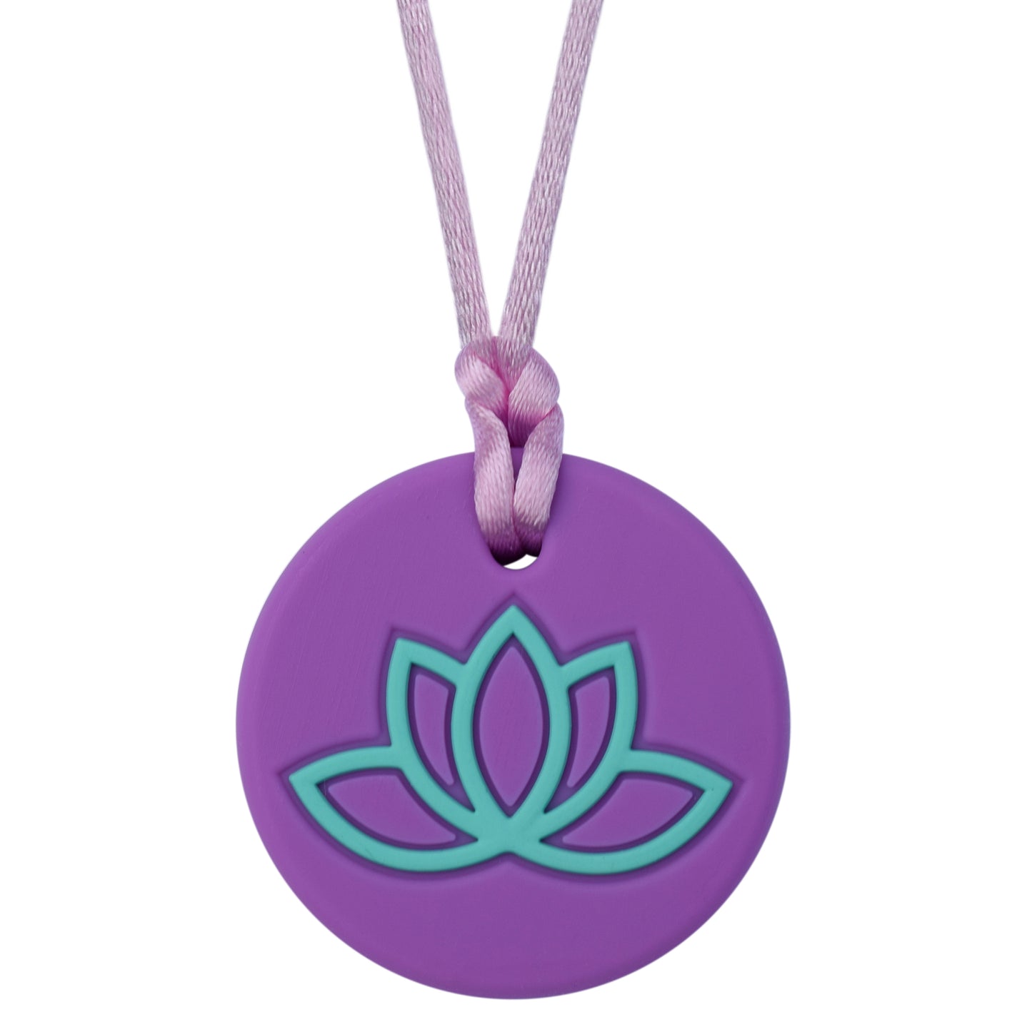 A purple chew necklace with a lotus flower design on the pendant, attached to a black cord.