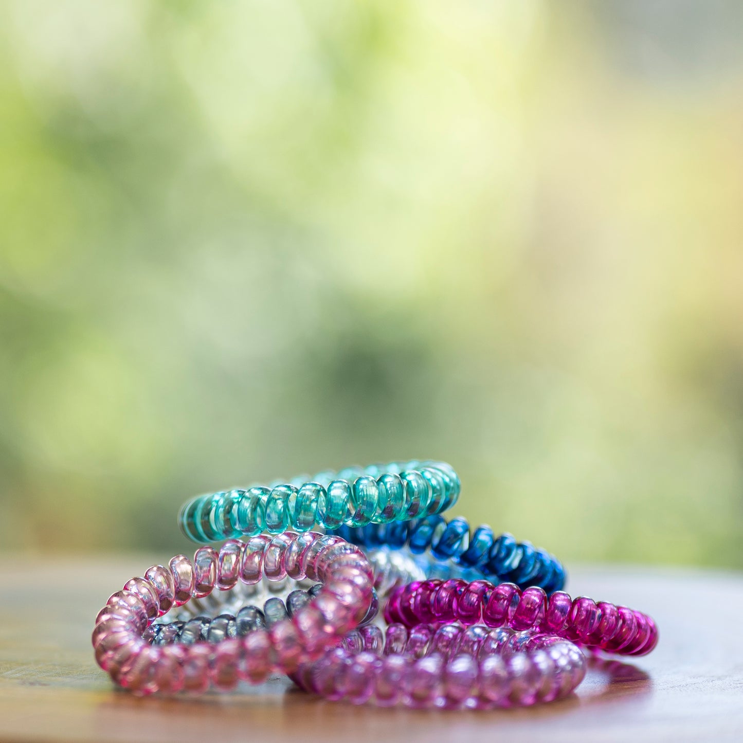 Stack of Munchables Coil Fidget Stimming Bracelets